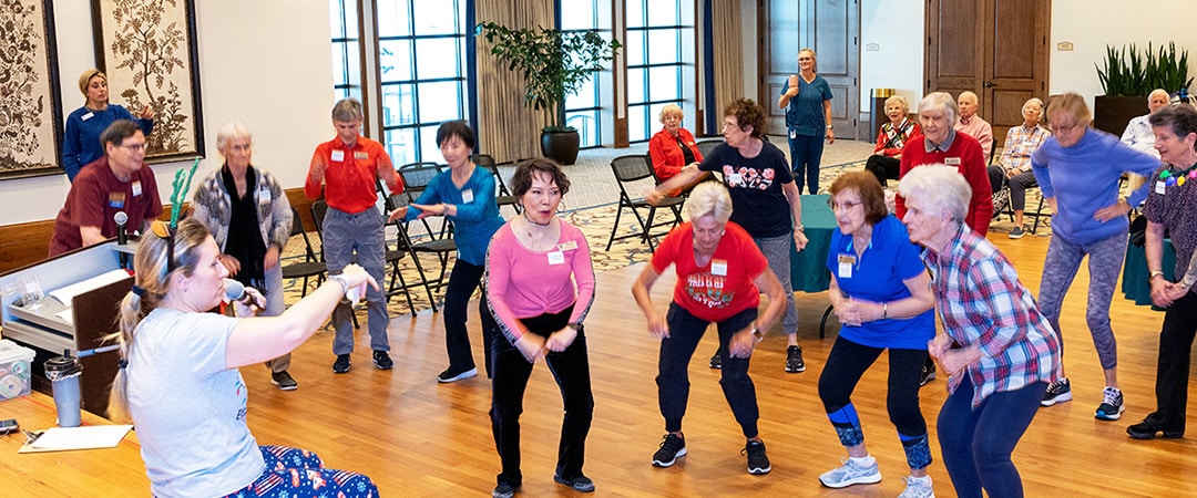 TheGlen-1080x450-2 A group of residents doing exercises together